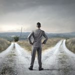 Undecided businessman weighing his choice